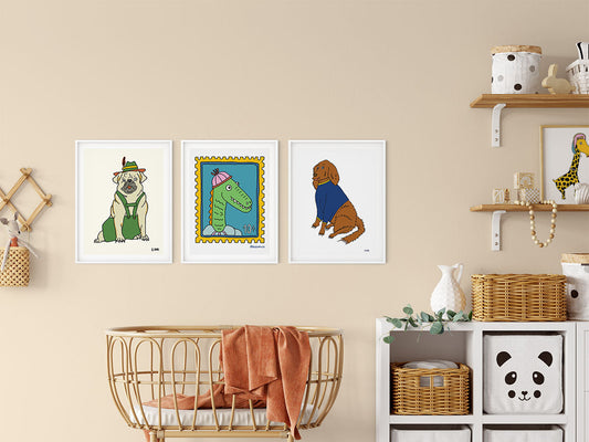 Three art prints on a nursery wall: pug, lizard, and irish setter.