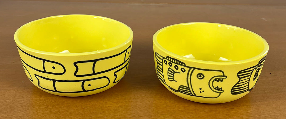 Bowls, mugs, and plates by Mad Dog Ceramics & A Duck Amuck Art Studio & Gift Shop