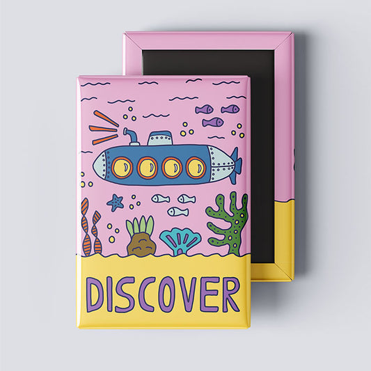 Colorful submarine refrigerator magnet featuring the word “Discover” in a whimsical underwater illustration by Erwin Ong.